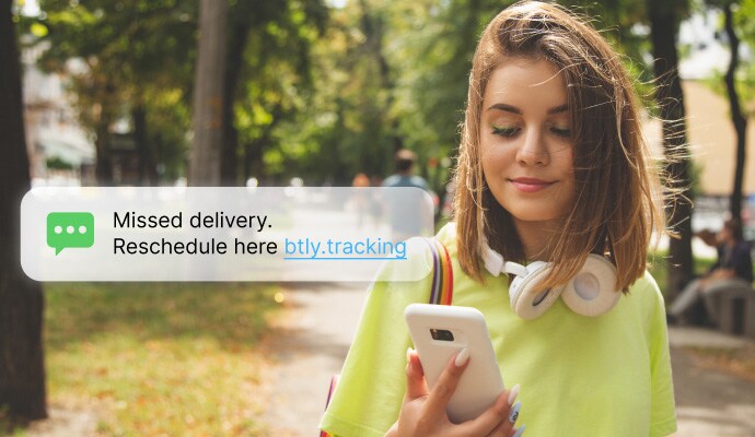 text message and call protection - a woman checking her messages on her phone